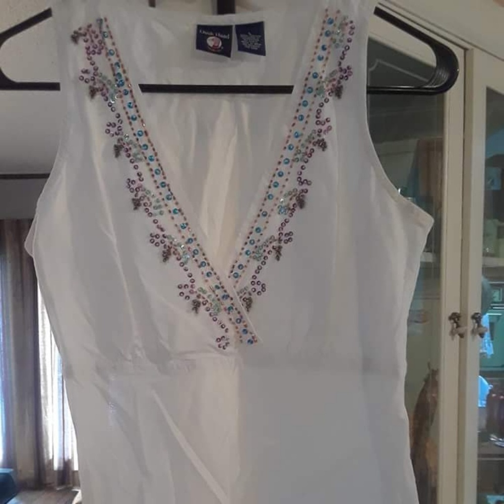 White sleeveless top with beading